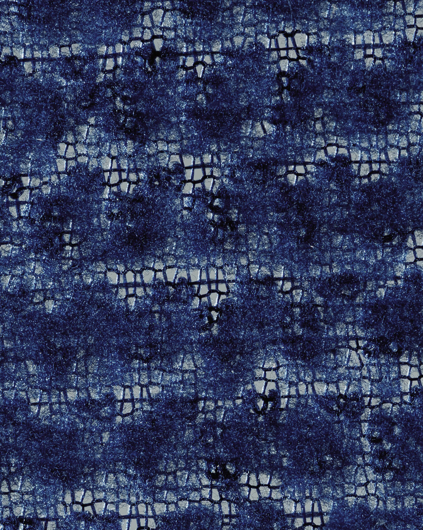 Close-up of navy blue textured PrimaLoft® insulation.