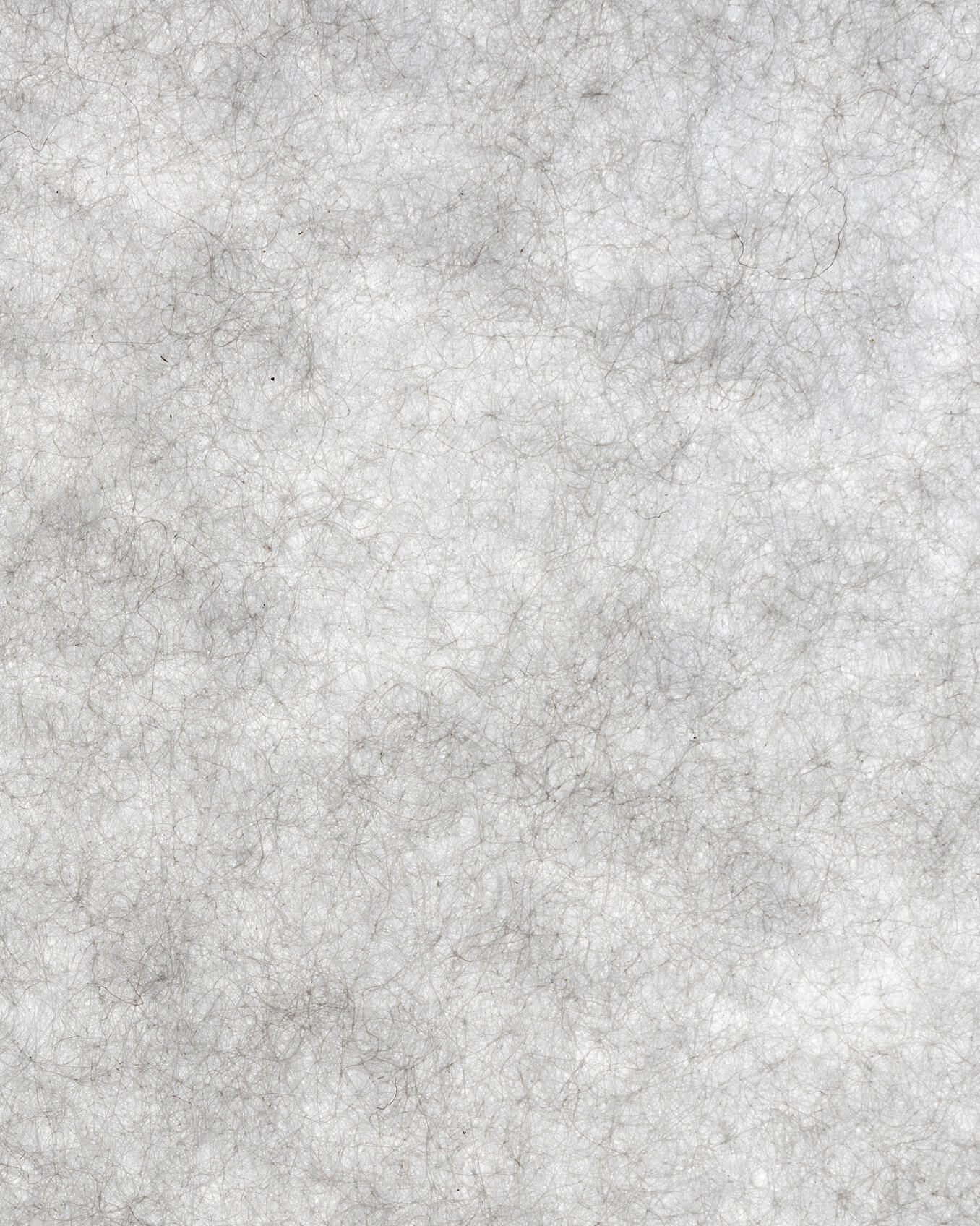 Close-up of a gray, felted PrimaLoft® insulation texture.